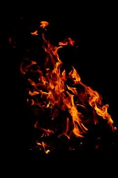 Flame of fire on a black background Stock Photos