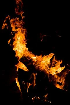 Flame of fire on a black background Stock Photos