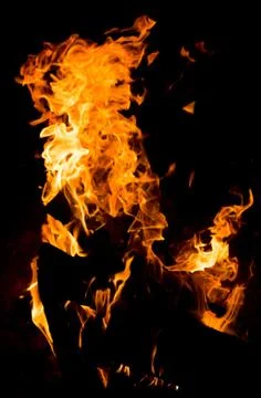 Flame of fire on a black background Stock Photos