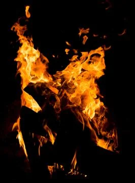 Flame of fire on a black background Stock Photos
