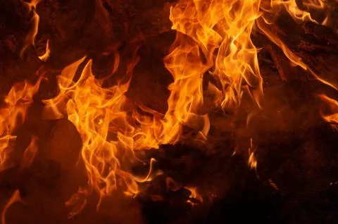 Flame of fire on a black background Stock Photos