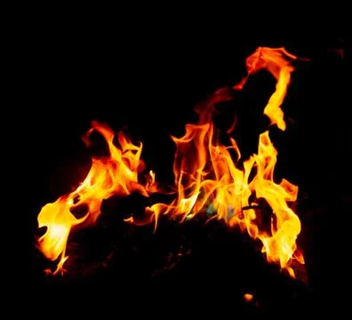 Flame of fire on a black background Stock Photos