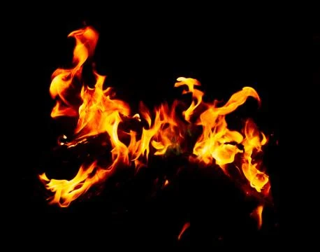 Flame of fire on a black background Stock Photos