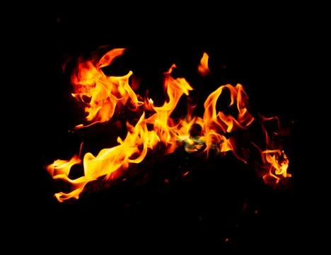 Flame of fire on a black background Stock Photos