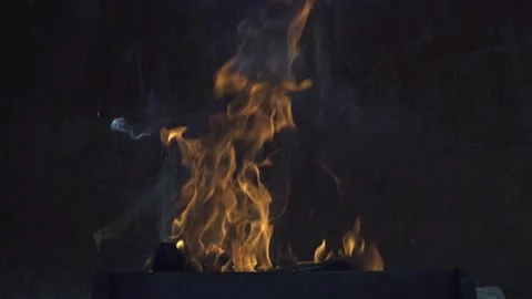 This is a flame of fire on a grunge background. Video stock 134350440