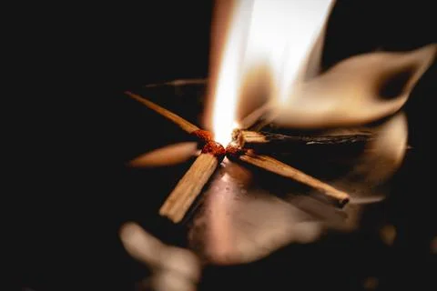 Flame of fire lit by matches 写真素材