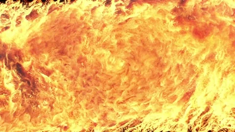 The flame of fire rages on the entire space of the screen, wrapping around in a Stock Footage 170190200