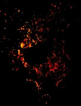 Flame of fire with sparks on a black background Stock Photos