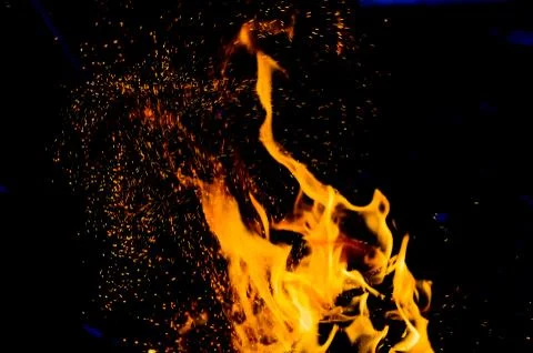 Flame of fire with sparks Stock Photos