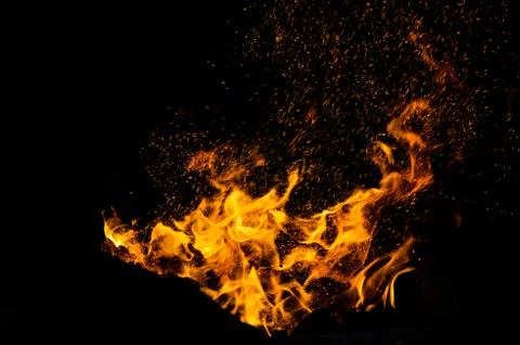 Flame of fire with sparks Stock Photos