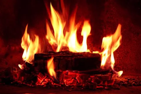 Flame in fireplace. Stock Photos