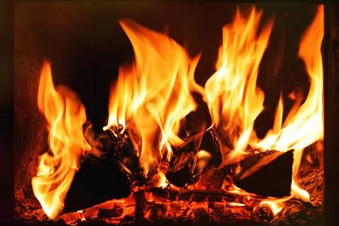 Flame in a fireplace Stock Photos