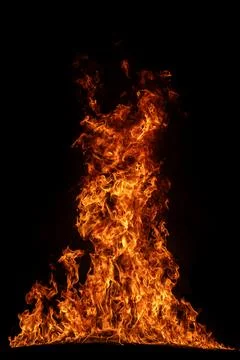 Flame forms inferno. Flame burns upward. Flame creates overlay. Flame revea.. 스톡 사진