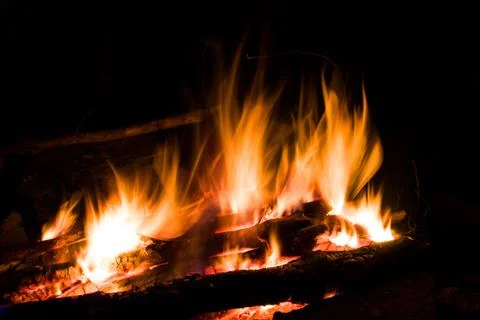 Flame of hot fire in dark 스톡 사진