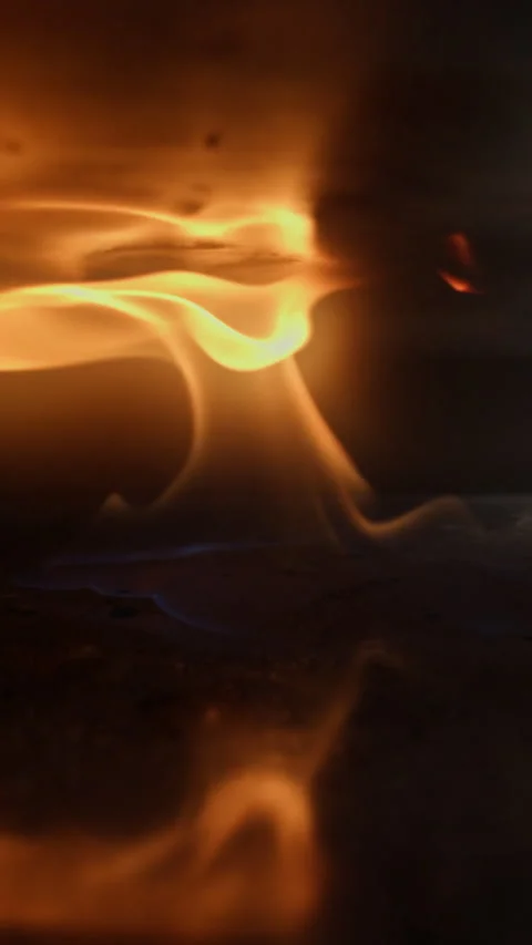 Flame igniting inside a gas oven Stock Footage 320836219