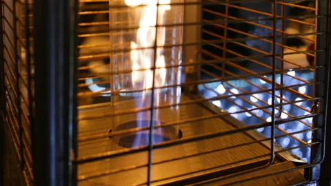 The flame inside the lantern is lit. Closeup, outdoor, evening, romantic atmosph Stock Footage 85673100