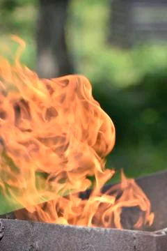 Flame in the iron box Stock Photos