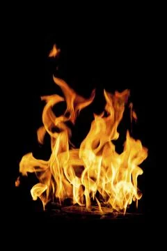 Flame isolated on a black background Stock Photos