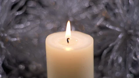 Flame Of A Lit  Candle with Silver Background, Christmas 스톡 동영상 128822246