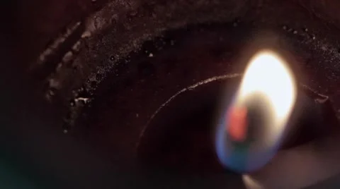 Flame melting red candle Stock Footage 8328104