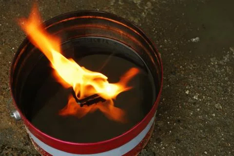 Flame of oil lamp Stock Photos
