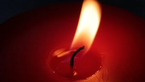 Flame of the red candle Stock-Footage 95876313