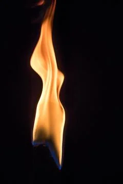 Flame of a torch in the darkness Foto stock