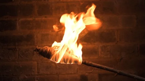 Flame torch on stick self ignites 스톡 동영상 91603077