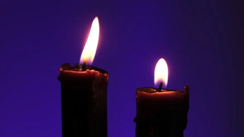 Flame Of Two Candles Flickering From Wind Stock Footage 339019953