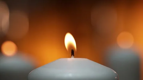 Flame of a White Candle Flickering in Slow Motion Stock Footage 271007700