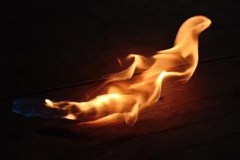 Flame on a wood Stock Photos