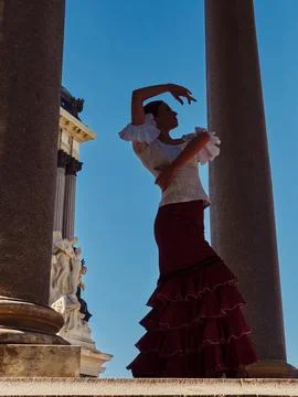 Flamenco dancer with a cloudless blue sky Stock Photos