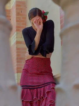 Flamenco dancer with covered face while dancing. Stock Photos