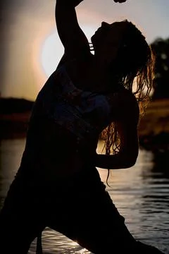 Flamenco dancer at sunset with shadow silhouette. Stock Photos