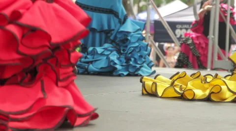 Flamenco dancers performing in long-train flamenco dresses Stock-Footage 56293771