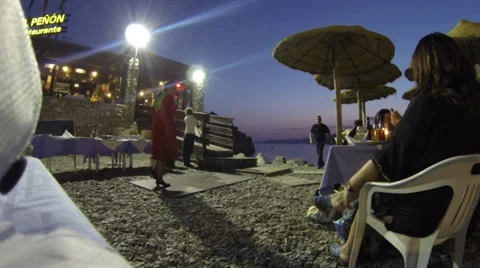 Flamenco dancing by twilight at restaurant in Spain Stock Footage 30575284
