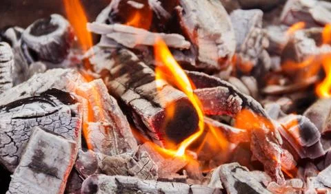 The flames and coals of fire Stock Photos