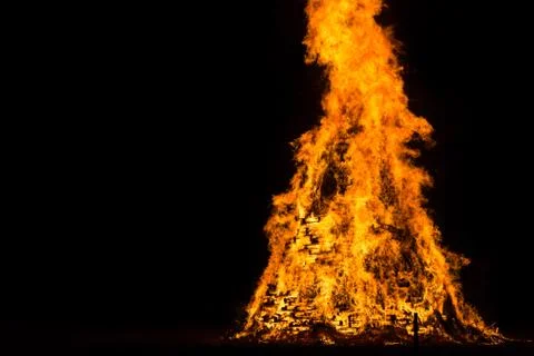 Flames and fire released by a pyre for the traditional epiphany festival in Stock Photos