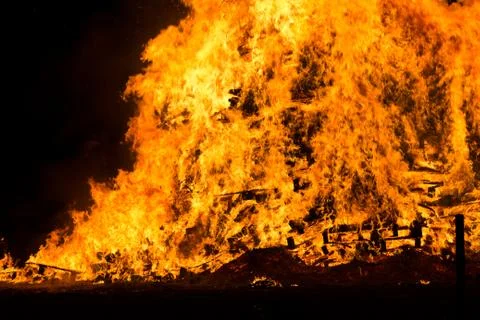 Flames and fire released by a pyre for the traditional epiphany festival in Stock Photos