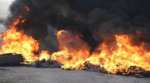 Flames and smoke from tires on fire Stock Footage