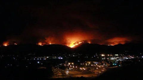 Flames behind a city Stock Footage 109206782