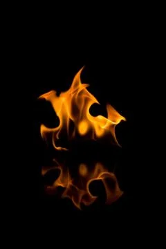 Flames with a black background. Close up. Stock Photos