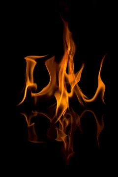 Flames with a black background. Close up. Stock Photos