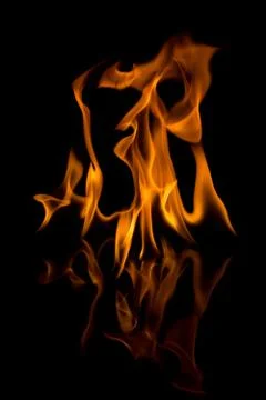 Flames with a black background. Close up. Stock Photos