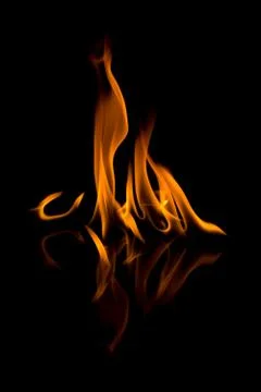 Flames with a black background. Close up. Stock Photos
