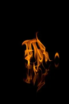 Flames with a black background. Close up. Stock Photos