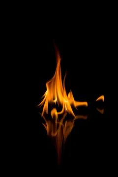 Flames with a black background. Close up. Stock Photos