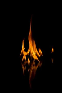 Flames with a black background. Close up. Stock Photos