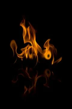 Flames with a black background. Close up. Stock Photos