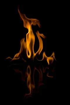 Flames with a black background. Close up. Stock Photos